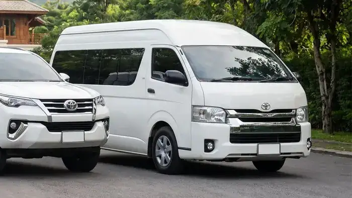 White SUV and van, ready for a long drive
